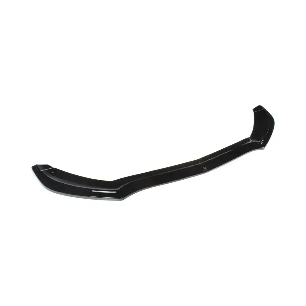 Frontspoiler til Mercedes C-Klasse W205 Coupe V.1, svart blank plast sett ovenfra mot hvit bakgrunn.