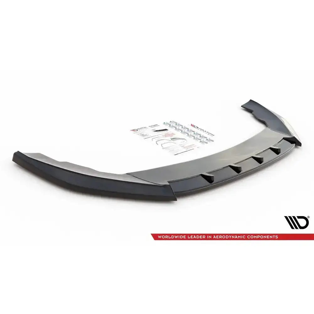 Front lip til Seat Leon FR Mk4 V.1, svart plast med monteringsutstyr og instruksjoner på hvit bakgrunn.