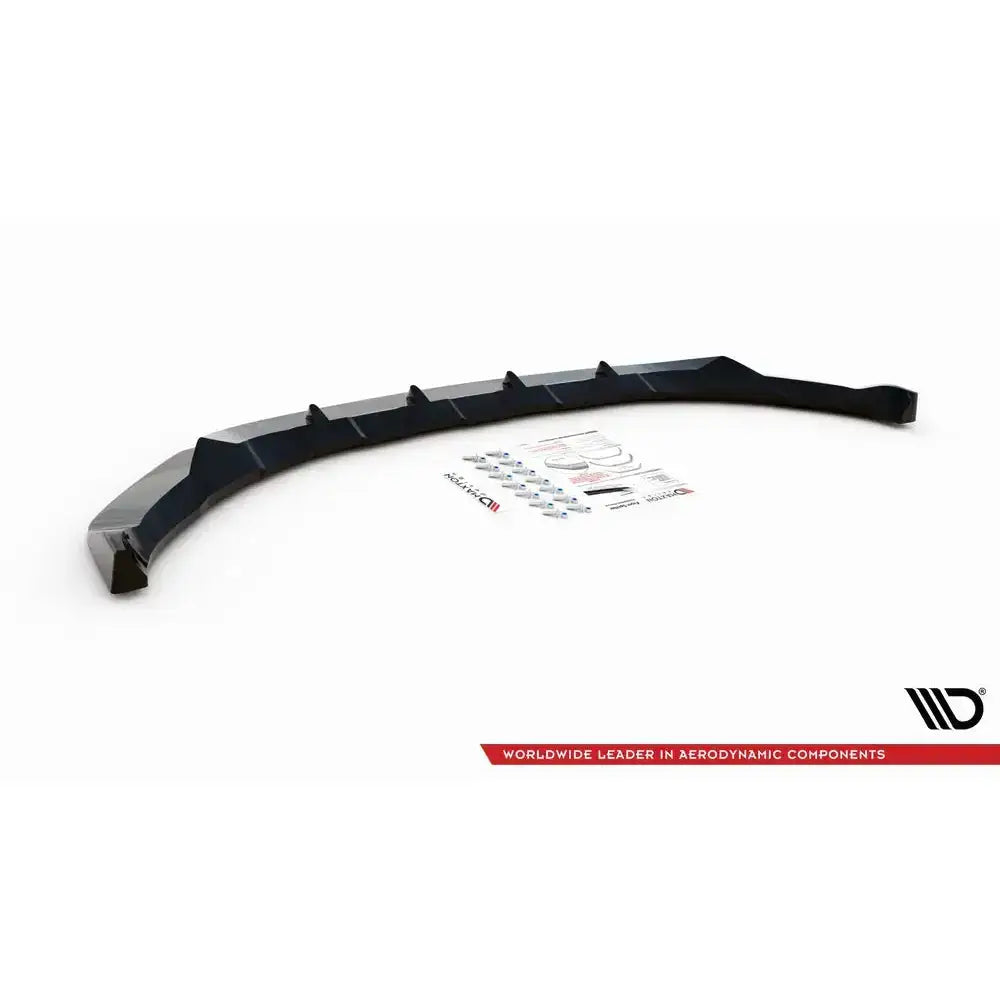 Front splitter til Volkswagen T-Roc Mk1, sort plast med monteringsutstyr og instruksjoner på hvit bakgrunn.