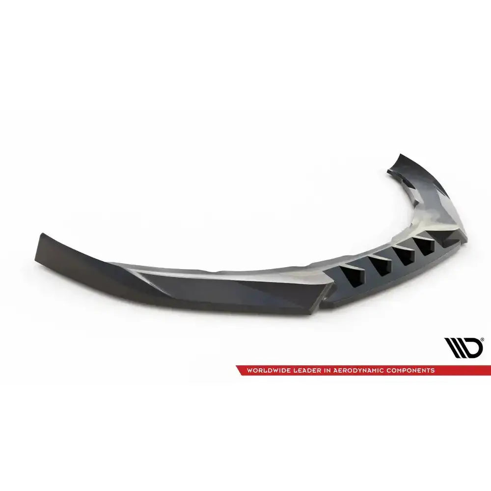 Front splitter til Volvo S60 R-Design Mk2, sort blank plast med fem trekantede luftåpninger.