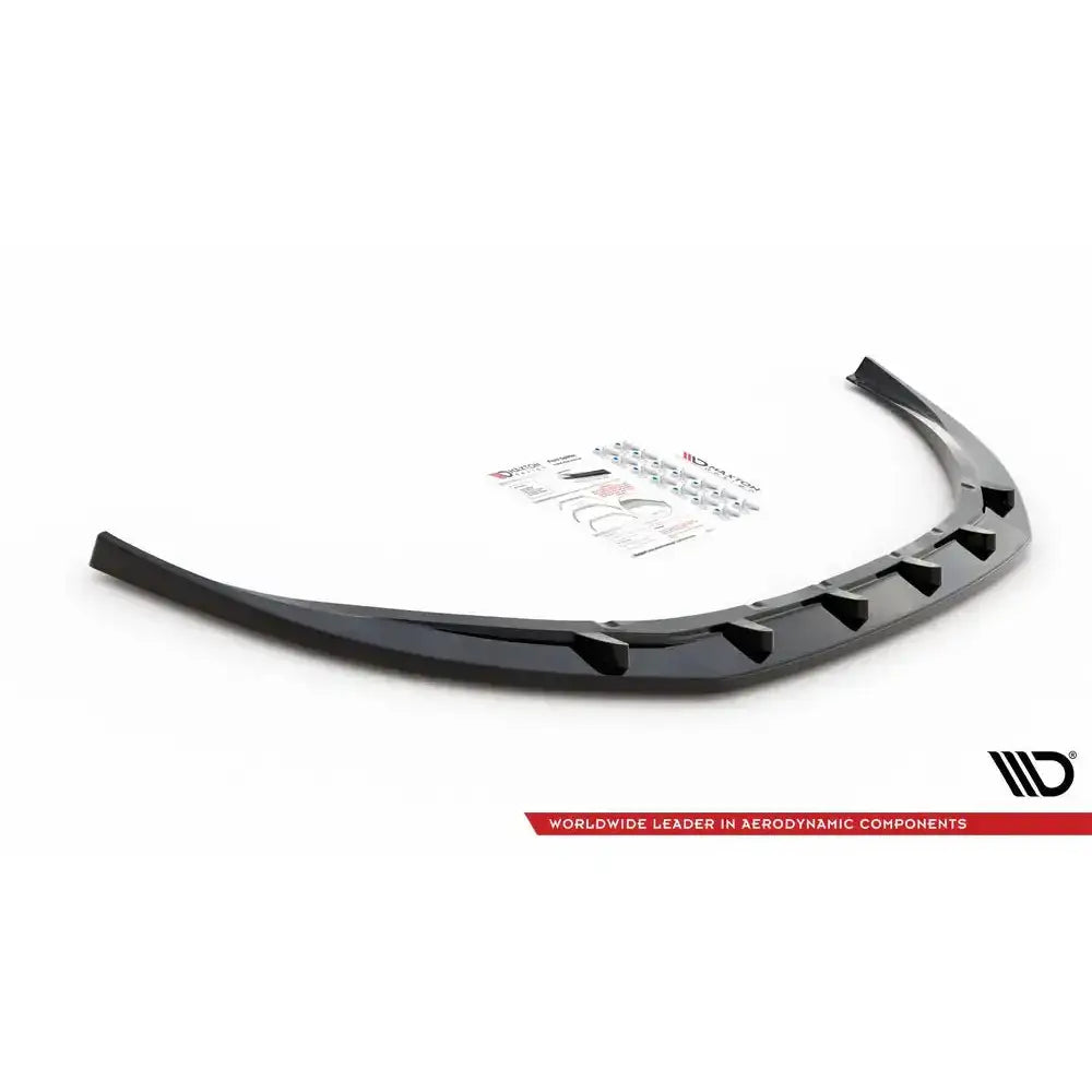 Front splitter til Volvo V70 Mk3 V.1, sort plastdel med monteringsutstyr og instruksjoner på hvit bakgrunn.