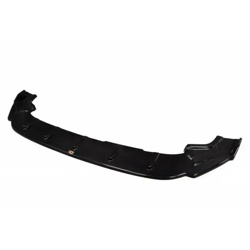 Frontleppe V.1 VW Golf VII R i sort plast med blank finish, sett ovenfra mot hvit bakgrunn.