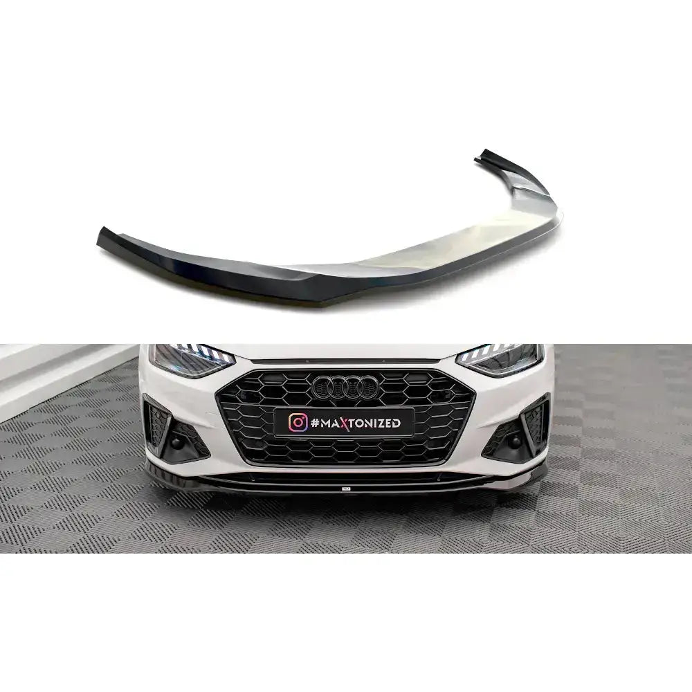 Frontleppe V.2 Audi A4 S-Line montert på hvit bil, sett forfra med sort, aerodynamisk design.
