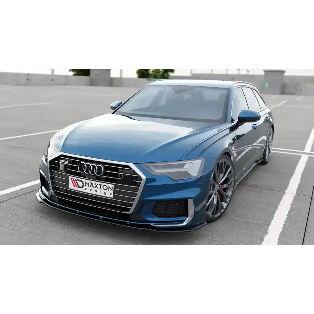 Frontspoiler på metallic blå Audi A6 S-Line C8 med sorte felger og senket understell.