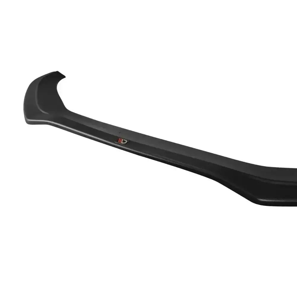 Frontspoiler Audi S4 B8 FL V.2 i sort plast, sett skrått med logo i midten mot hvit bakgrunn.