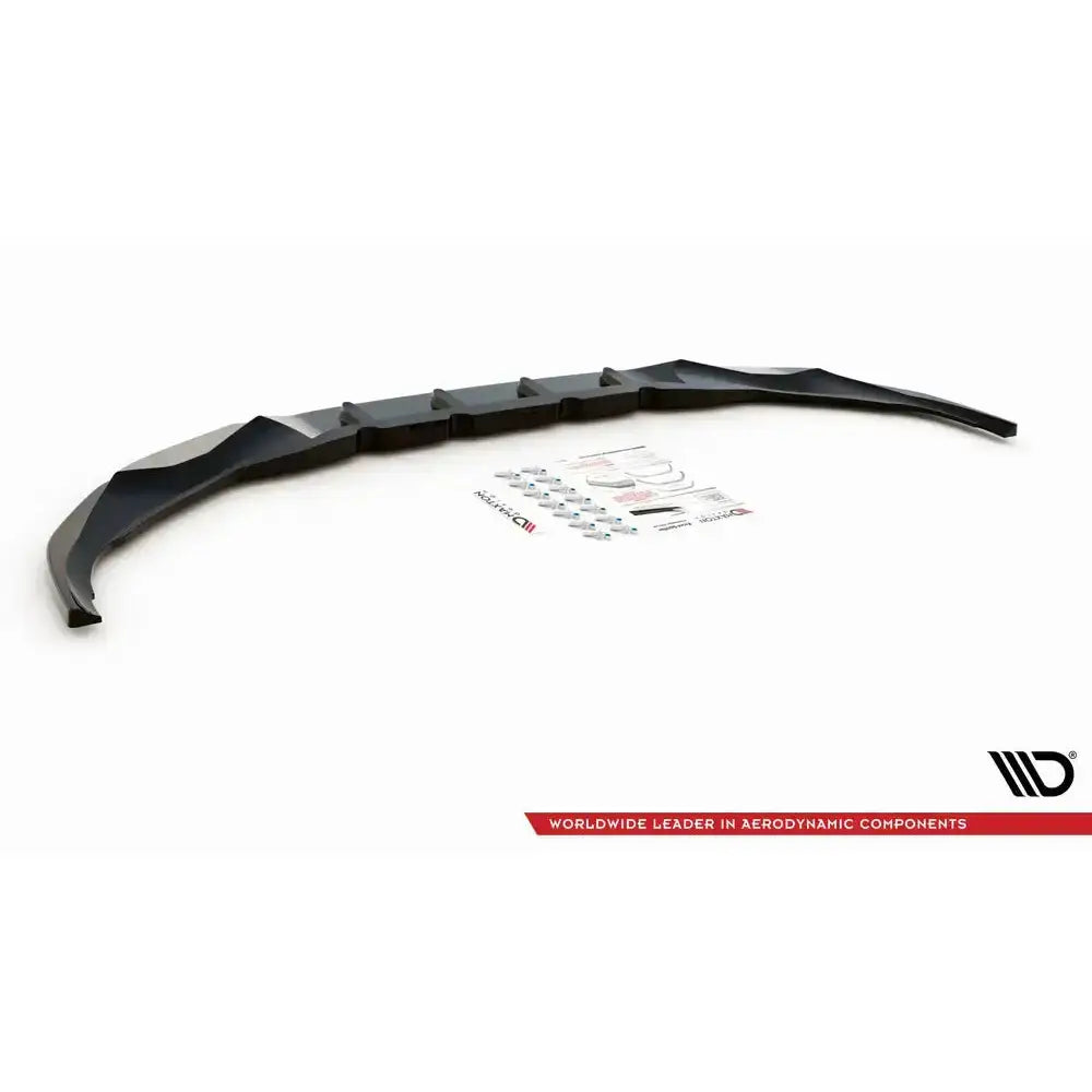Front splitter til Bmw 7 G11 M-Pack Facelift V.2, sett forfra med monteringsutstyr og instruksjoner.