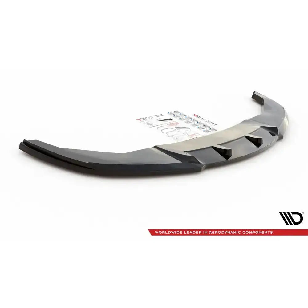 Front splitter til BMW 7 M-Pack F01 V.2, sort plast med finner, monteringsutstyr synlig bak.