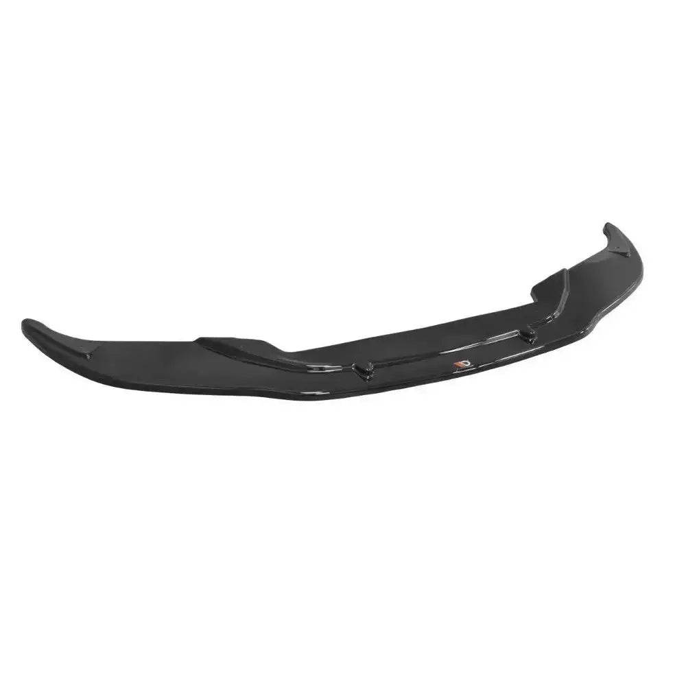Front lip til BMW M6 E63 V.2, sort blank plast med aerodynamisk design og synlige monteringsdetaljer.