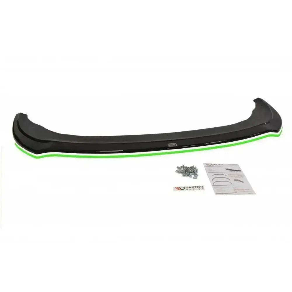 Front splitter til Seat Leon Mk2 Cupra V.2, sort plast med grønn kant, sett ovenfra med skruer og instruksjoner.