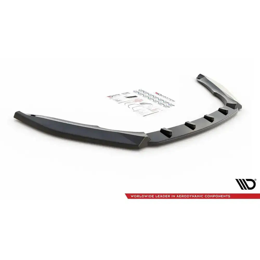 Front splitter til Skoda Octavia RS Mk3 Facelift, sort plast med ribber, monteringsutstyr i bakgrunnen.