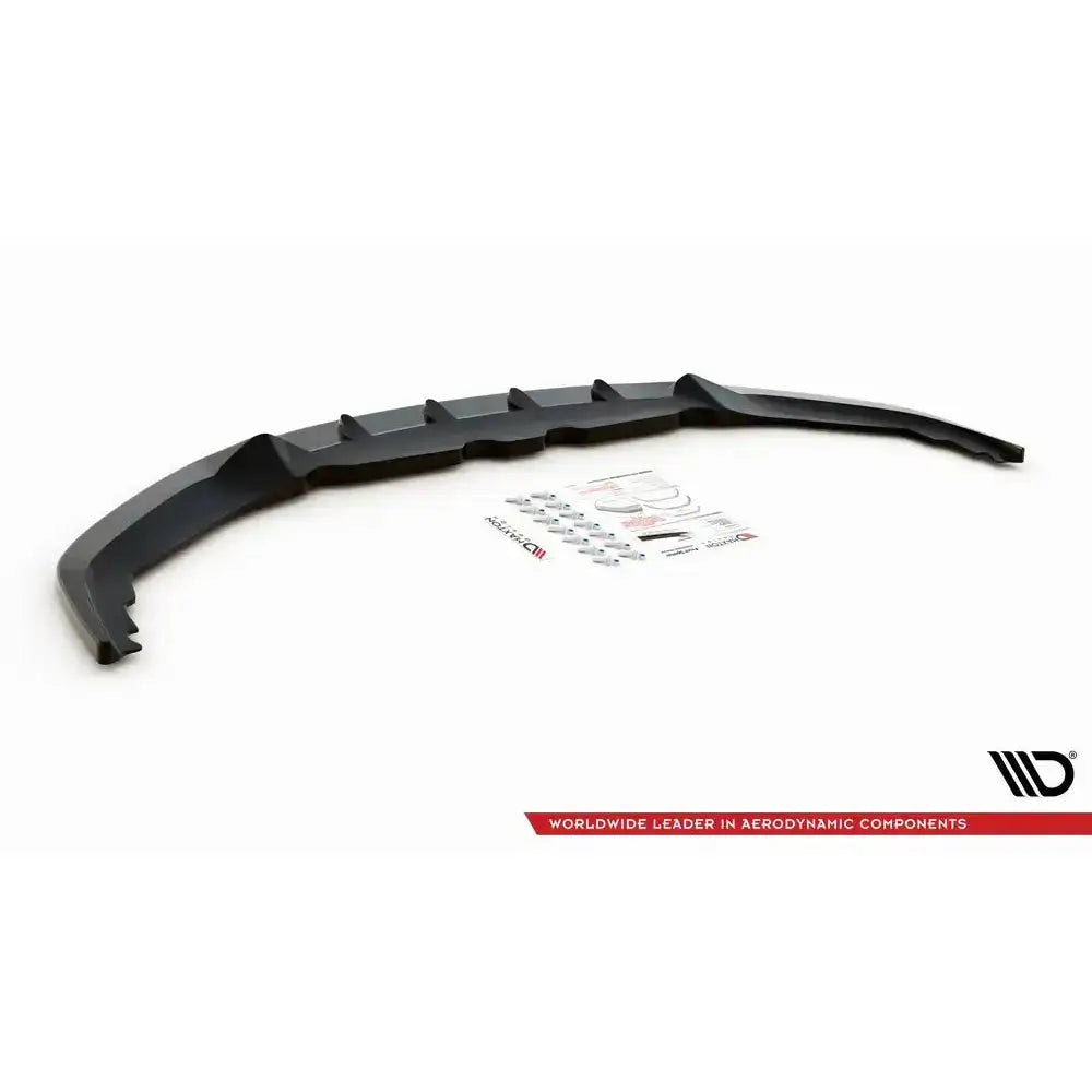 Front splitter for BMW 8 Serie Coupe G15, svart plast med monteringsutstyr og instruksjoner.