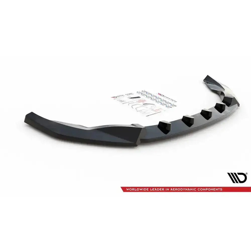 Front splitter til Nissan 370Z Facelift V.3 med monteringsutstyr og instruksjonsark i bakgrunnen.