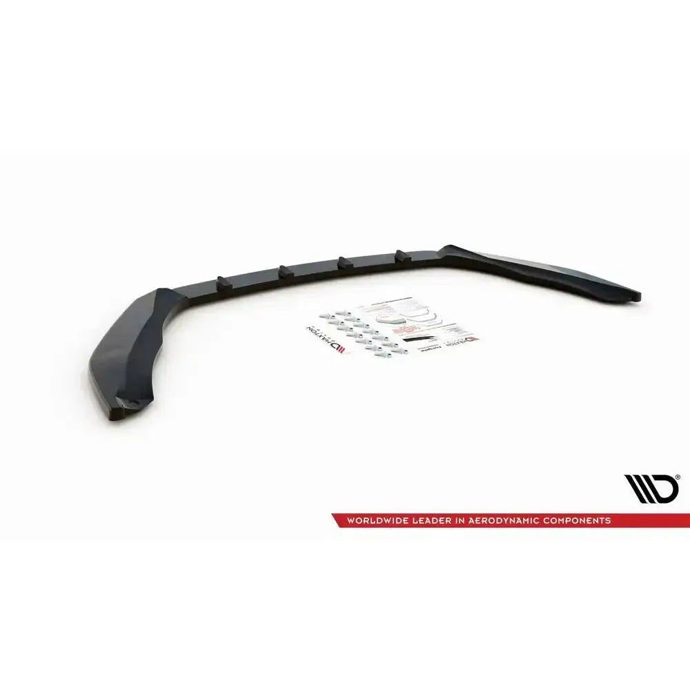 Frontspoiler til Skoda Octavia RS Mk3 V.3, svart plast med festedeler og monteringsutstyr, sett skrått ovenfra.