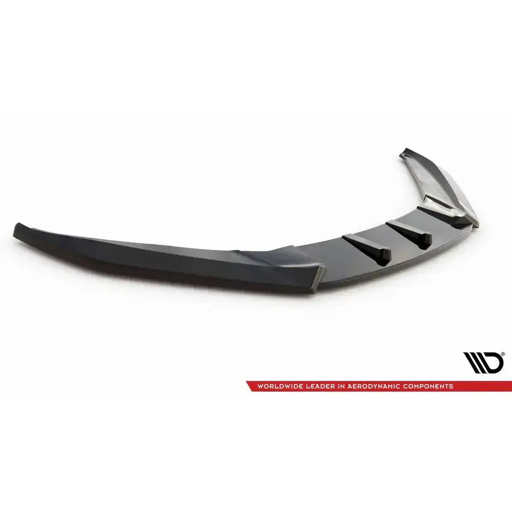 Front splitter til Volkswagen Scirocco Mk3 V.3 med aerodynamiske finner, sort plast, sett skrått ovenfra.
