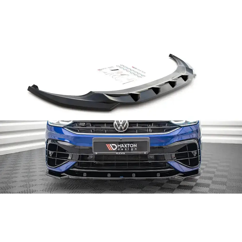 Frontleppe til Volkswagen Tiguan R V.3 i sort plast med luftkanaler, vist på hvit bakgrunn.