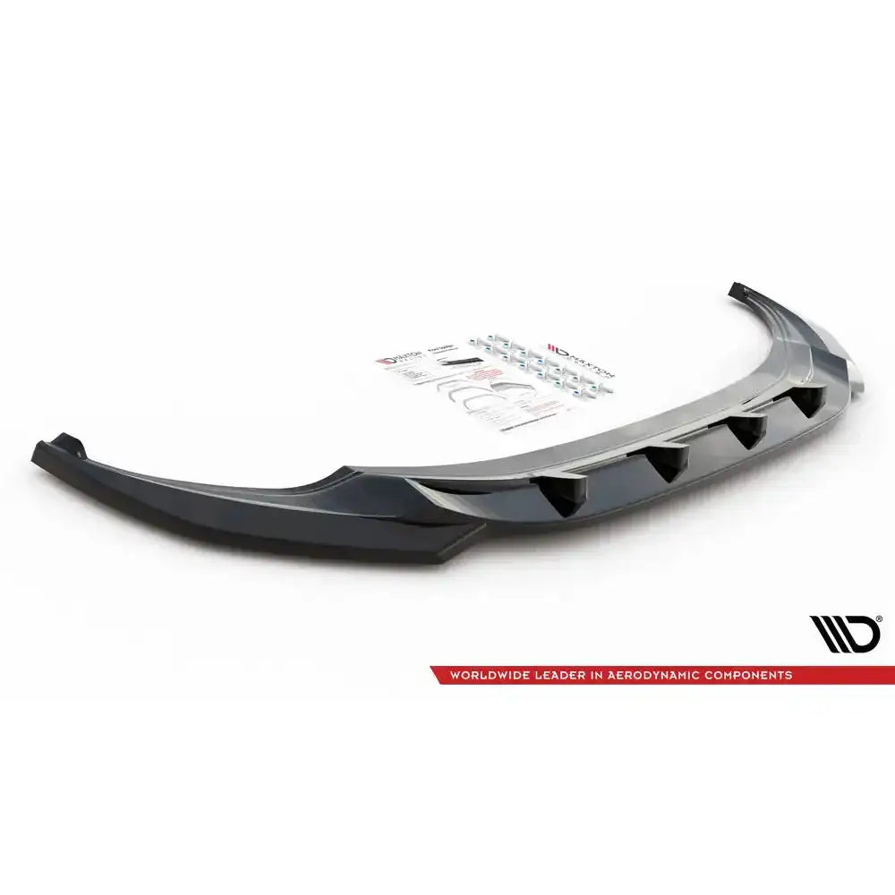Front lip til Volkswagen Tiguan R V.3 i sort blank plast, sett skrått ovenfra med monteringsutstyr.