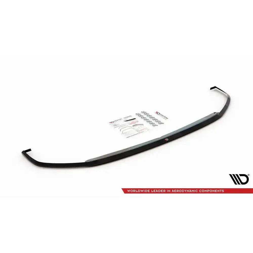 Frontspoiler til VW Polo GTI MK6 V.3 sett skrått ovenfra med monteringsutstyr og instruksjoner ved siden av.
