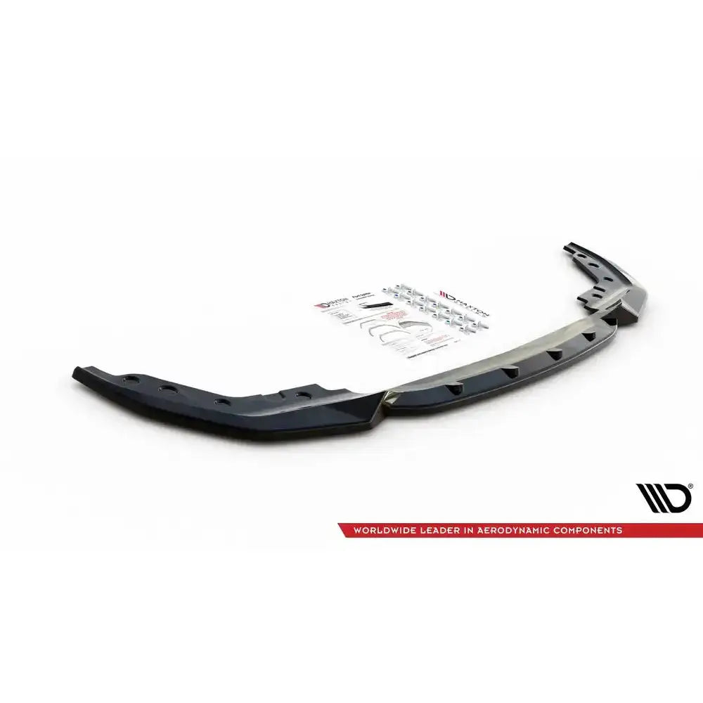 Front lip til BMW 3 G20/G21 M-Pack V.4, svart plast, sett skrått ovenfra med monteringsutstyr bak.