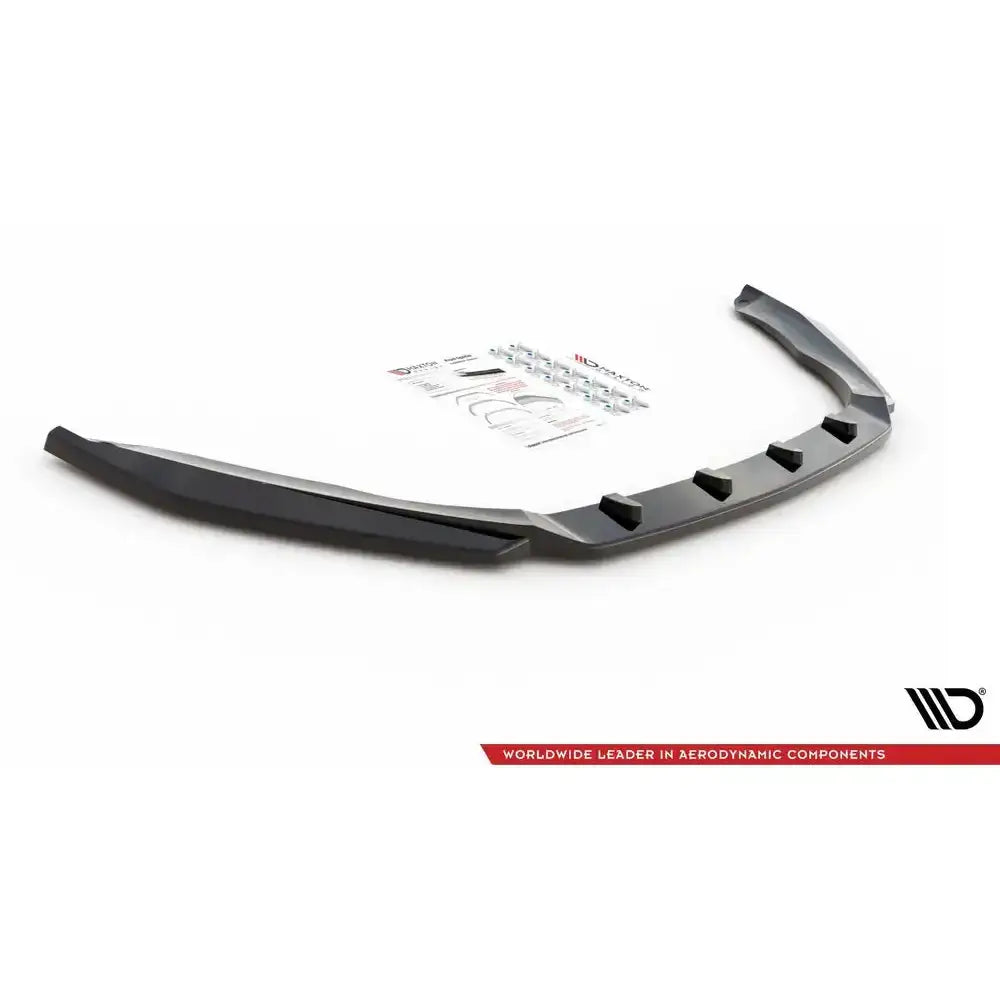 Frontspoiler til Skoda Octavia RS Mk3 V.4, svart plast med monteringsutstyr og instruksjoner bak.