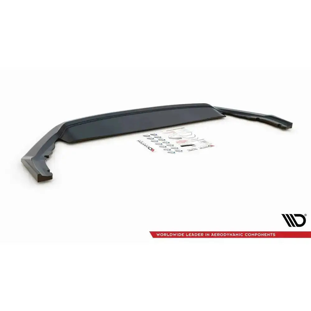 Front lip Skoda Octavia RS Mk4 V.4 sort plast med monteringsutstyr og instruksjoner på hvit bakgrunn.