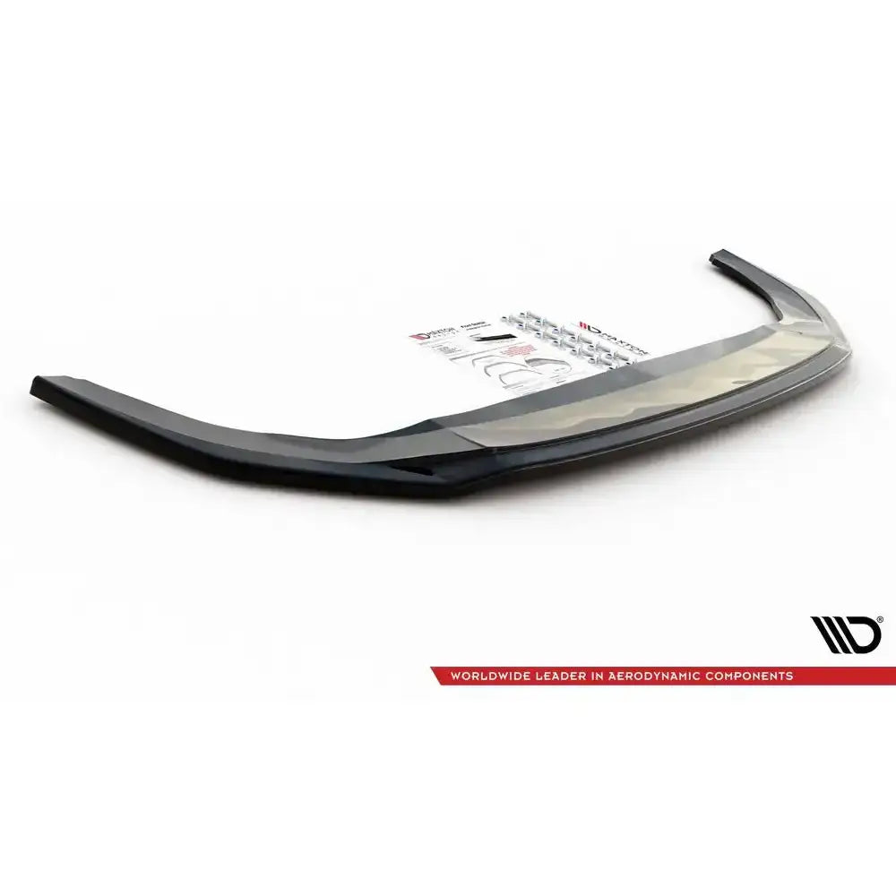 Frontspoiler til Volkswagen Golf 8 GTI V.4 i sort blank plast med monteringsutstyr og instruksjoner.