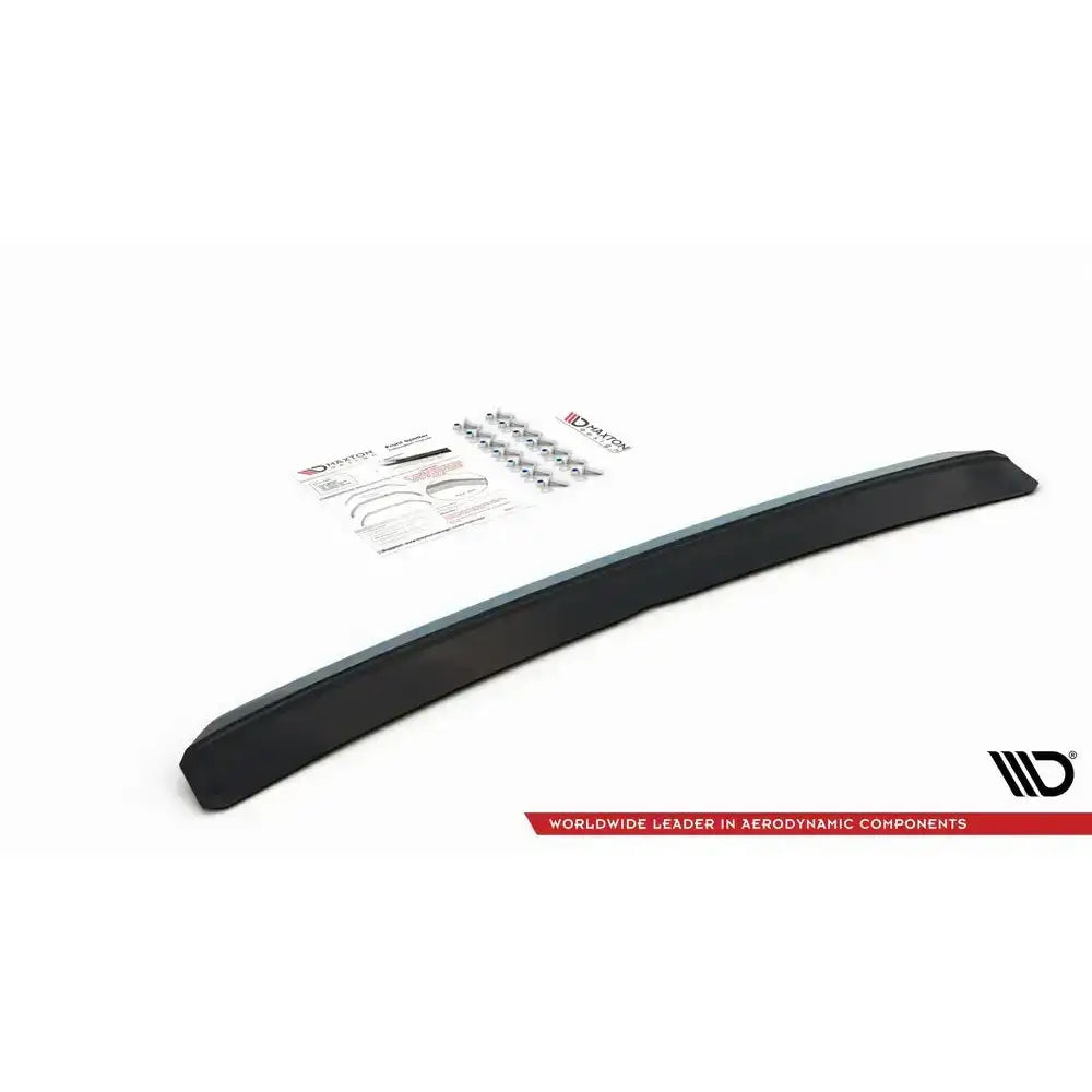 Frontspoiler til VW Polo GTI MK6 V.4 sett skrått ovenfra med monteringsskruer og instruksjoner i bakgrunnen.