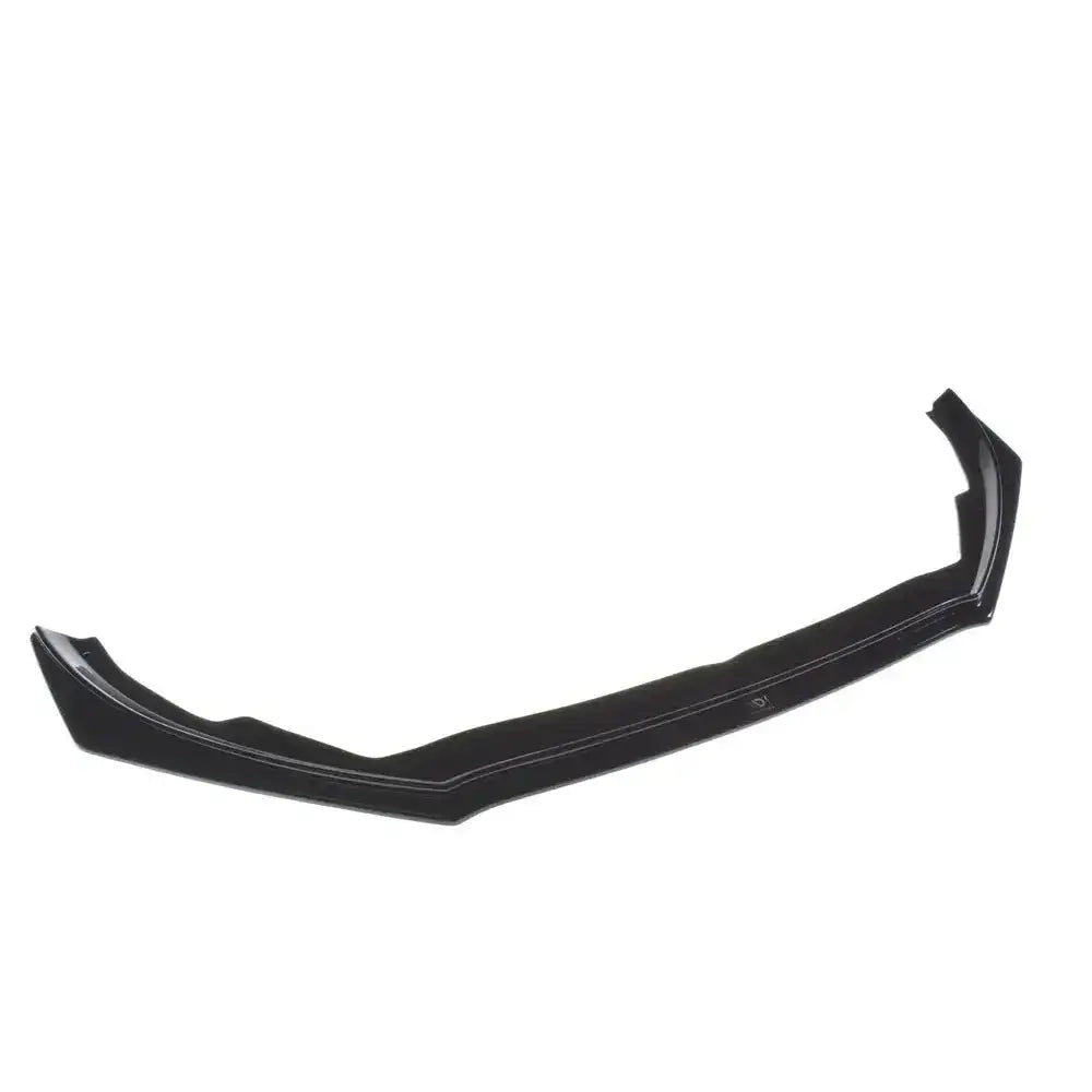 Front splitter til Ford Focus ST / St-Line MK4, svart plast med markerte kanter, sett skrått ovenfra.