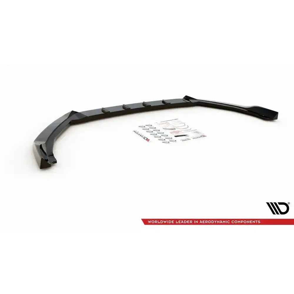 Frontsplitter til Ford Focus ST / St-Line MK4 med tilbehør og monteringsutstyr på hvit bakgrunn.