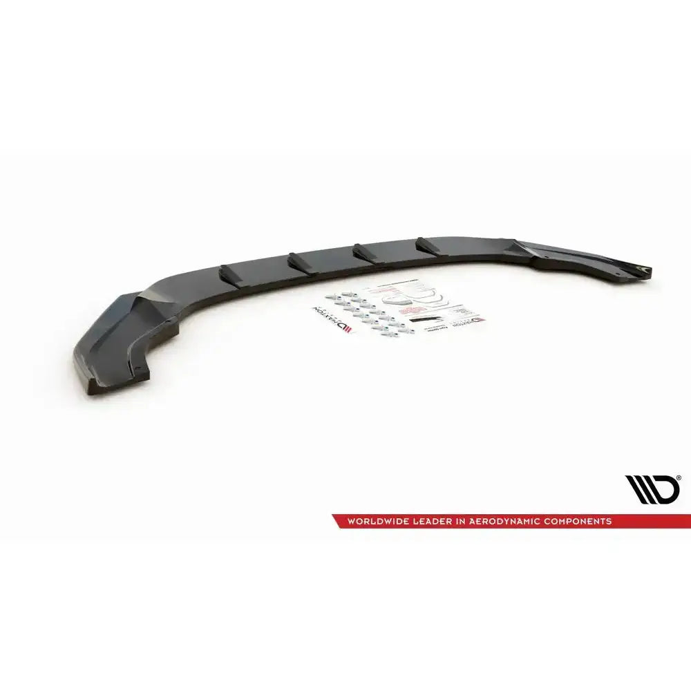 Frontsplitter V.9 VW Golf 7 R Facelift sett skrått ovenfra med monteringsutstyr og klistremerker.