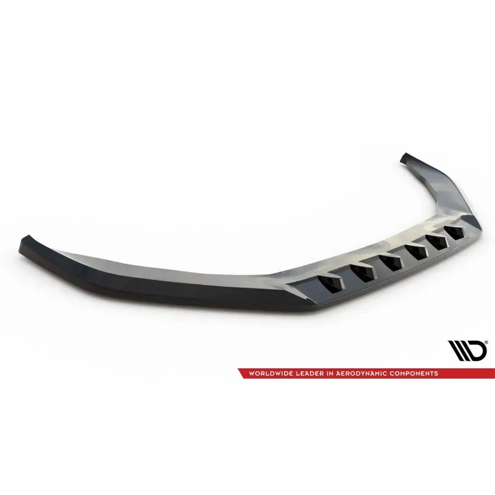 Front splitter til Porsche Panamera E-Hybrid 971 i sort, blank plast med seks luftspalter, sett skrått ovenfra.