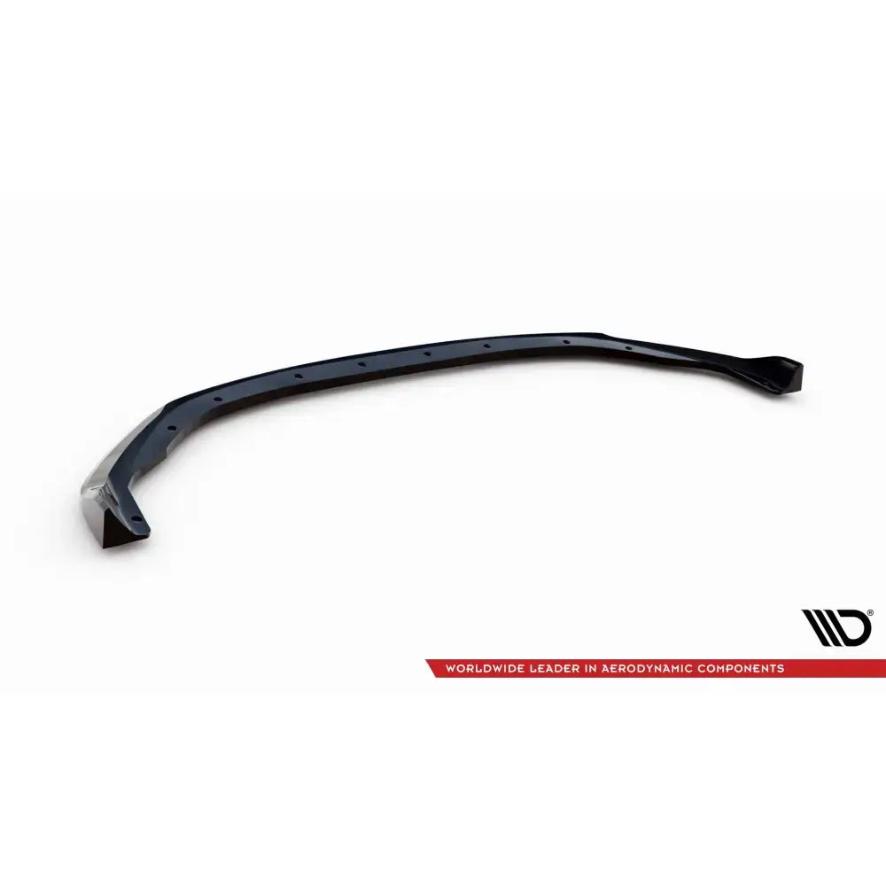 Front splitter til Renault Clio RS Line Mk5 i sort hardplast sett skrått ovenfra med monteringshull.