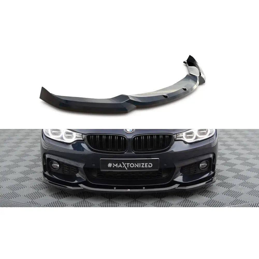 Frontleppe V2 BMW 4 Gran Coupe M-Pack F36 i sort plast montert på bil, vist forfra med tydelige detaljer.