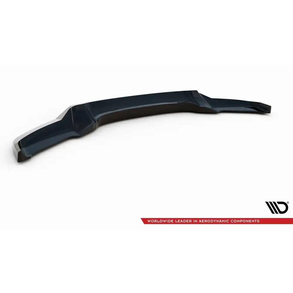 Front splitter for BMW X6 M-Pack F16 i svart, glanset plast med markerte kanter sett fra skrå vinkel.