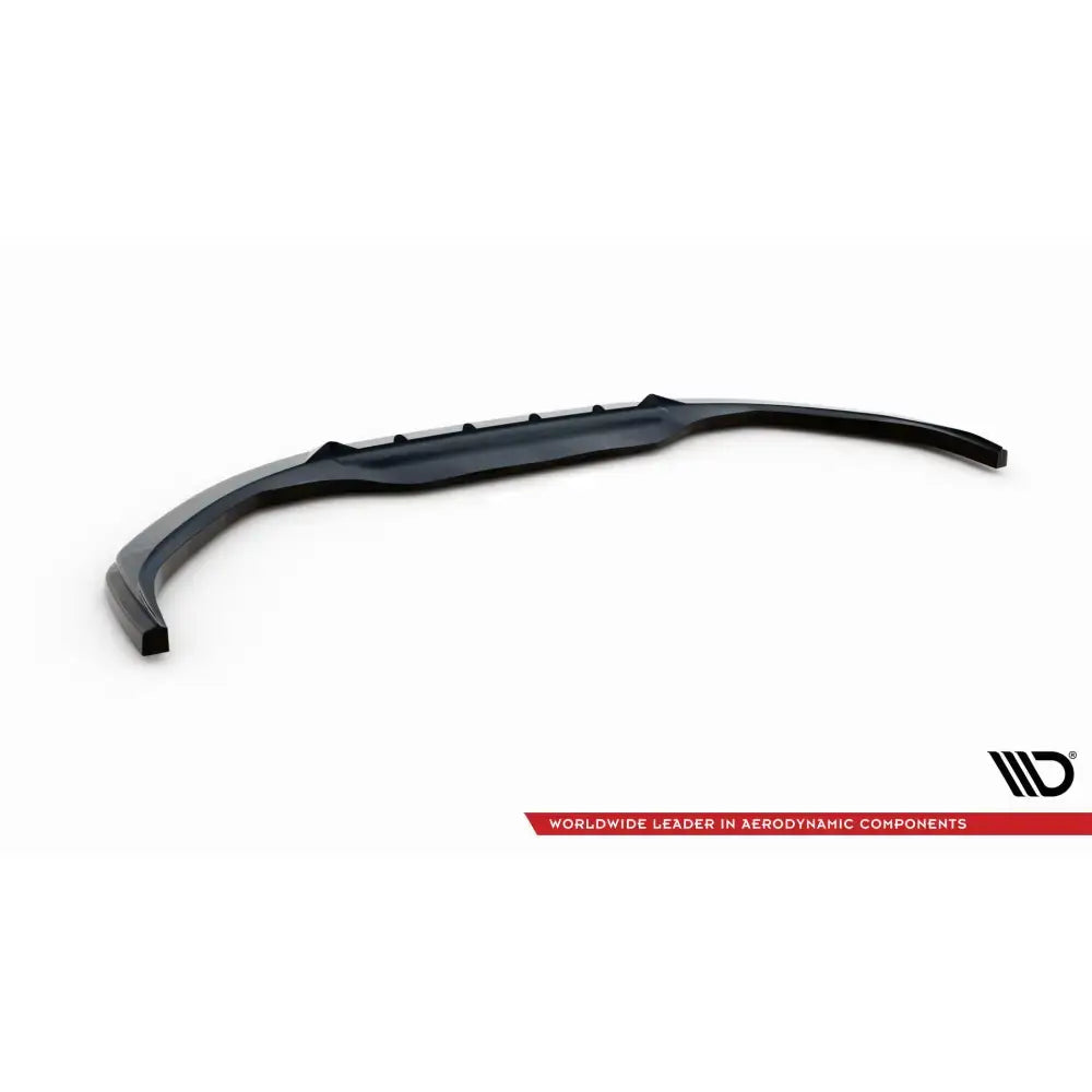 Frontleppe V2 Toyota Yaris Mk4 i sort plast med forhøyede detaljer, skrå vinkel mot hvit bakgrunn.