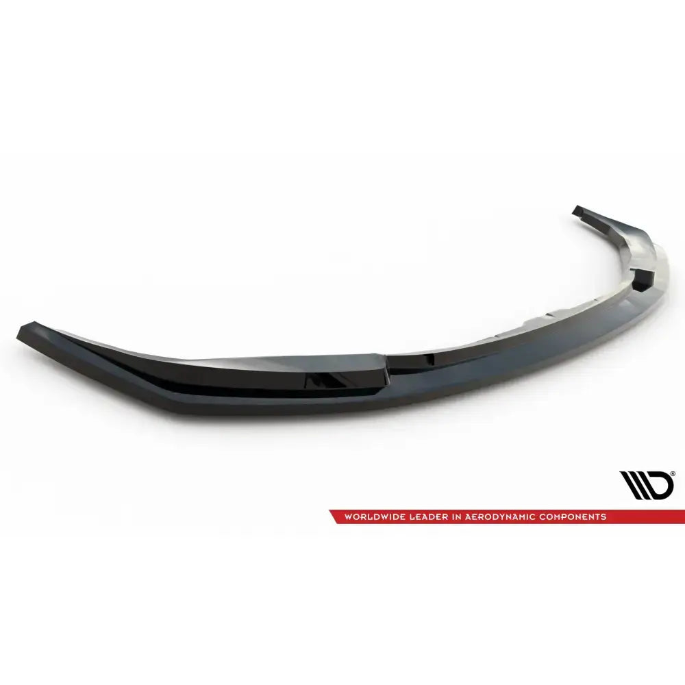 Front splitter til BMW M2 G87, sort og blank med buet form og markante kanter på hvit bakgrunn.