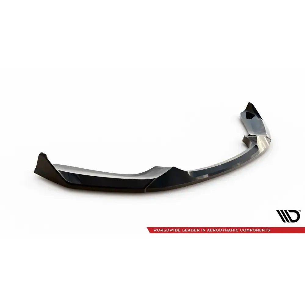 Frontspoiler V4 CSL Look til BMW 1 M-Pack F20, sort glanset med markerte hjørner mot hvit bakgrunn.