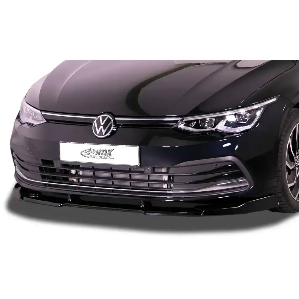 Frontleppe Volkswagen Golf 8 19- Vario X i sort, nærbilde av frontspoiler, grill og detaljerte frontlykter.