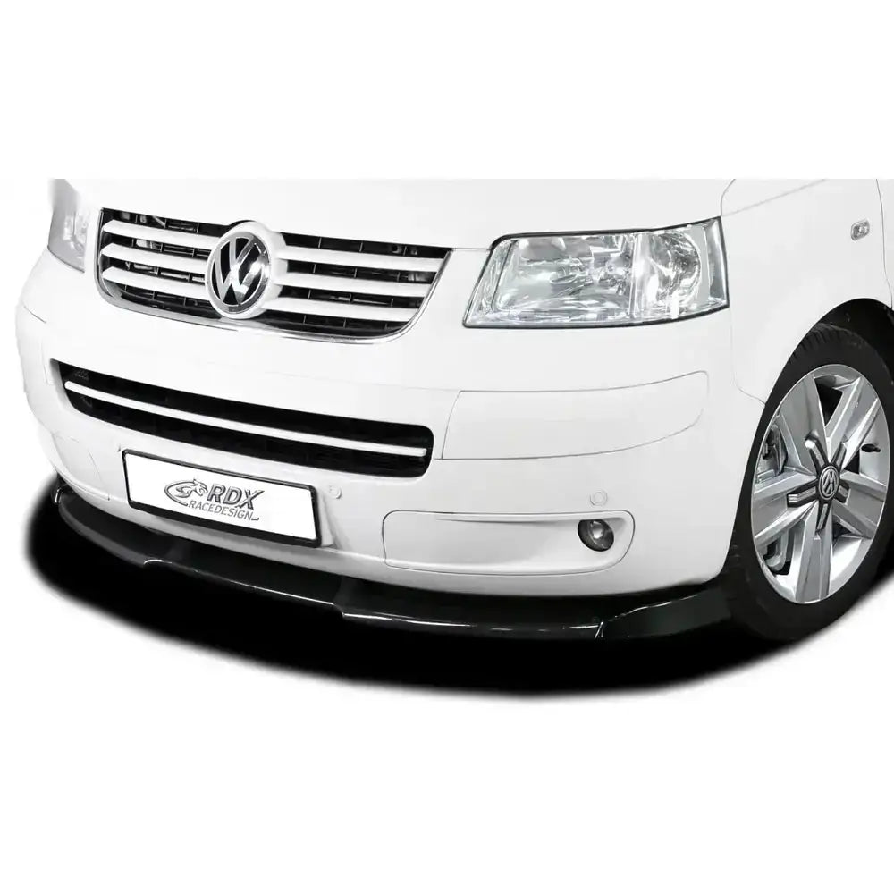 Frontleppe Volkswagen T5 med sort splitter under frontfanger og kromdetaljer på grillen.