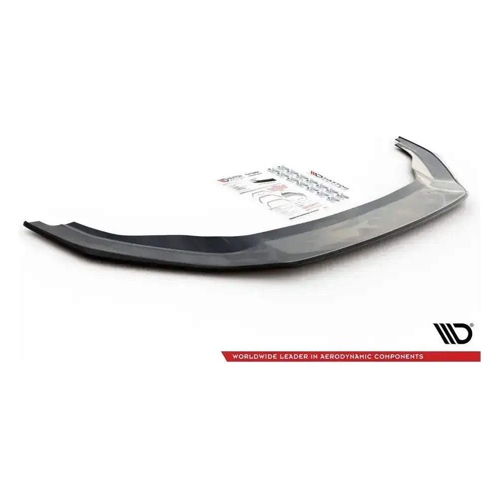 Front splitter til VW Golf 7 GTI TCR i sort, blank finish med festemateriell og monteringsanvisning bak.