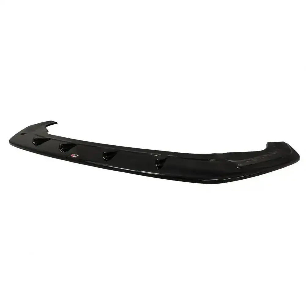 Frontleppe Vw Golf VII Gti Facelift V.1 i sort blank plast med markerte vinger og synlig emblemlogo.