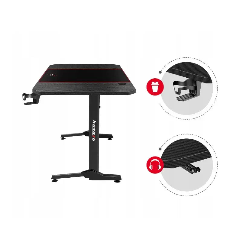 Gamingbord Huzaro Hero 4.7 svart, frontbilde med fokus på koppholder og hodetelefonkrok på høyre side.