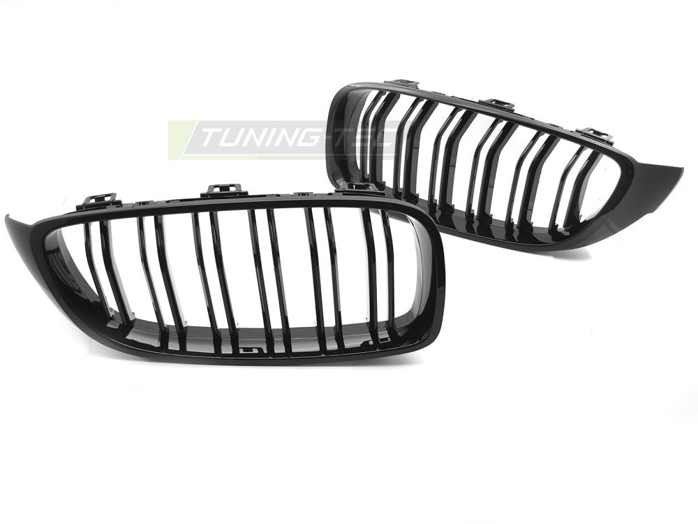 Nærbilde av glossy black grill med dobbel liste for BMW 2-serie F36
