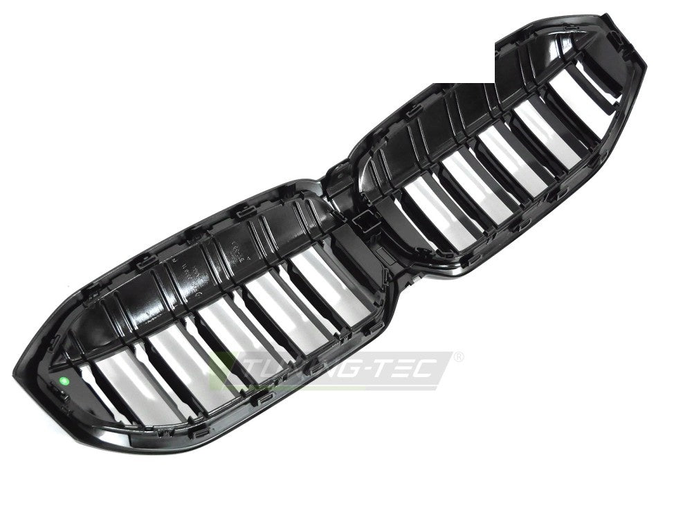 Detaljbilde av glossy svart dobbelt-bar sportsgrill BMW 3-serie G20