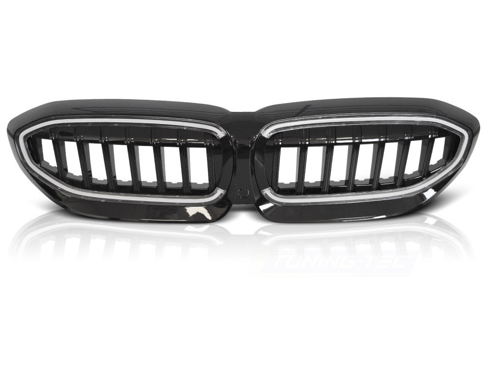 Nærbilde av svart BMW G21 touring grill med LED-detaljer GRBMF0