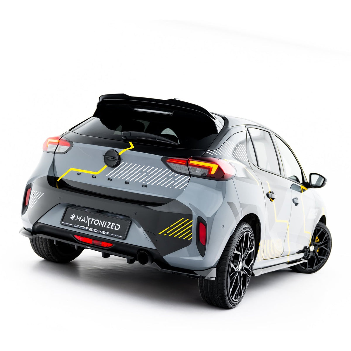 Hekksplitter med vertikale ribber til Opel Corsa F Facelift i blank sort ABS