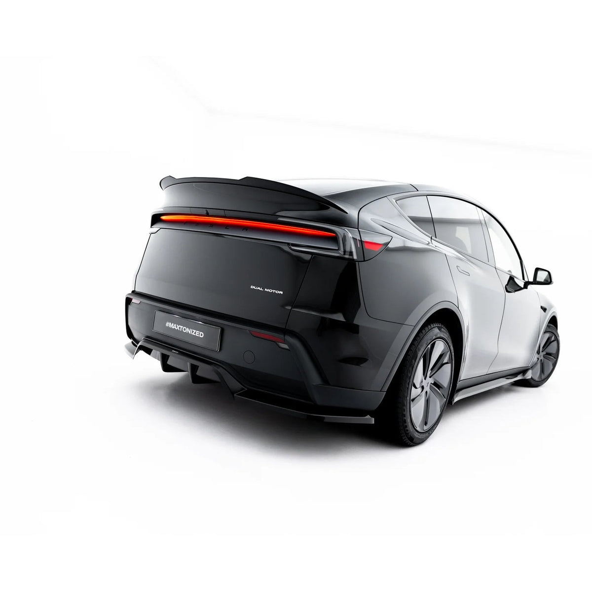 Hekksplitter i blank sort ABS til Tesla Model Y Premium Mk1 Facelift