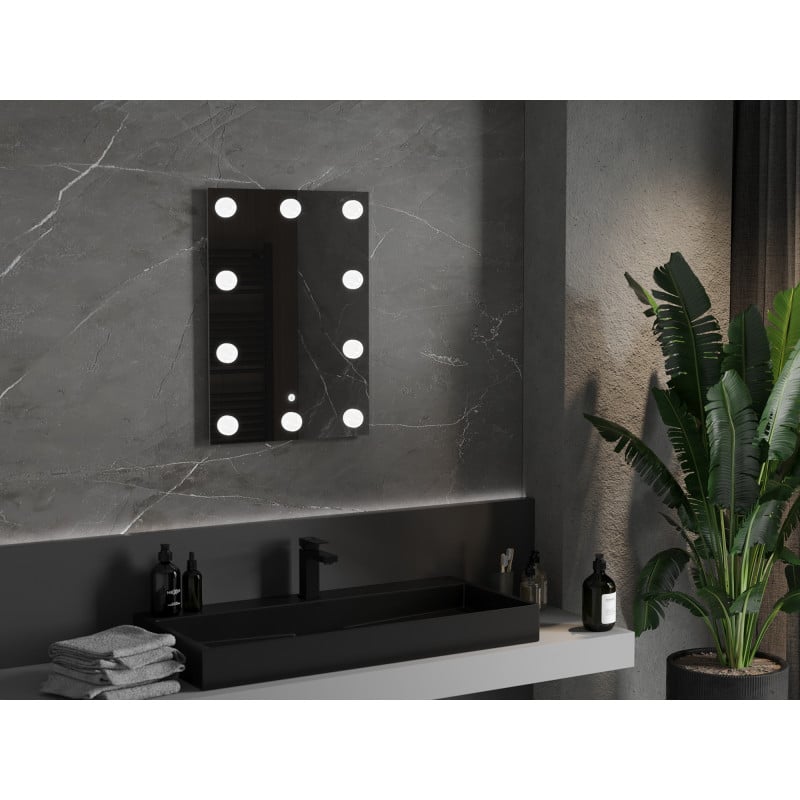 Baderomsspeil med lys Mexen Dona 50x70 cm med ni runde lamper, montert over svart servant.