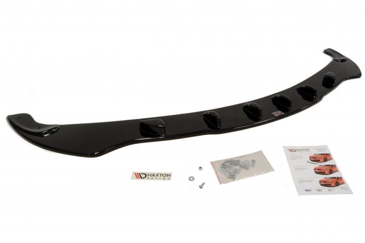 Frontleppe BMW 5 E60/E61 sort spoiler i blank plast, med monteringsutstyr og instruksjonshefte ved siden av.
