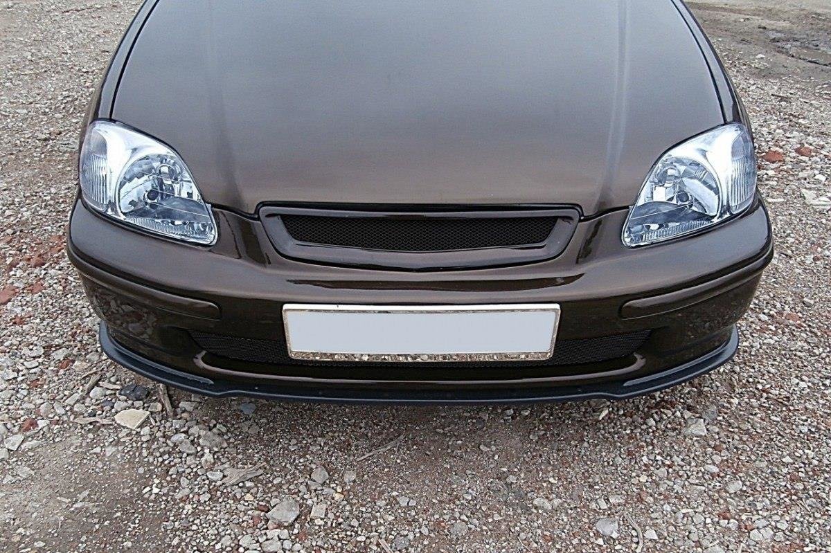 Frontspoiler Honda Civic MK6 Ej9 i brun farge med blank finish, klare lykter og sort grill.