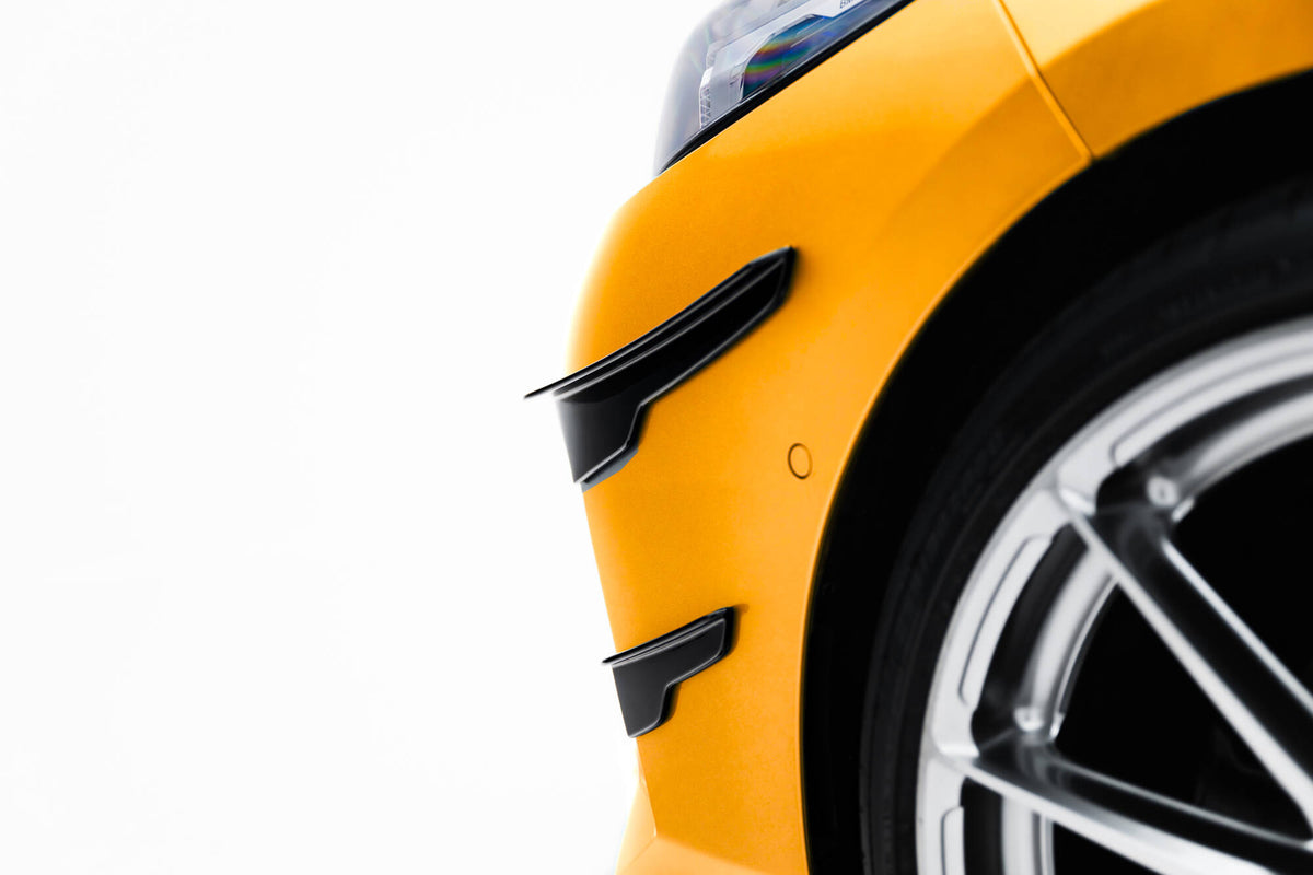 Maxton Design canards montert på fronten av BMW Serie 1 F70 M-Pack